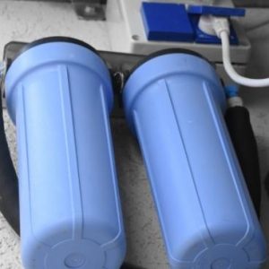 how does a whole house water filter work